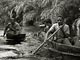Net fishing on a pirogue (Baka Pygmies, Gabon)